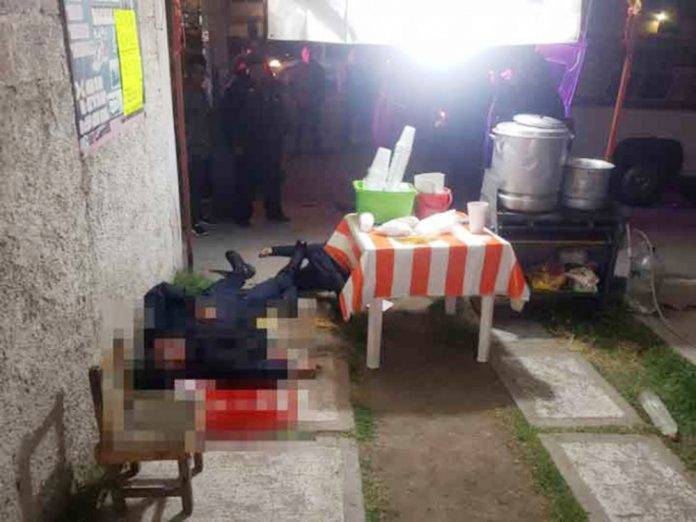 Ejecutan a dos polis mientras comían sus tamales