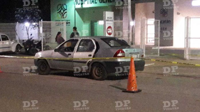 Autoridades hicieron el levantamiento del cadáver del automóvil donde era trasladado.