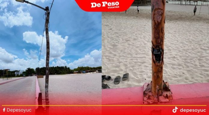 Se pasan de lanza: con una orqueta «reparan» poste de luz del muelle de Celestún